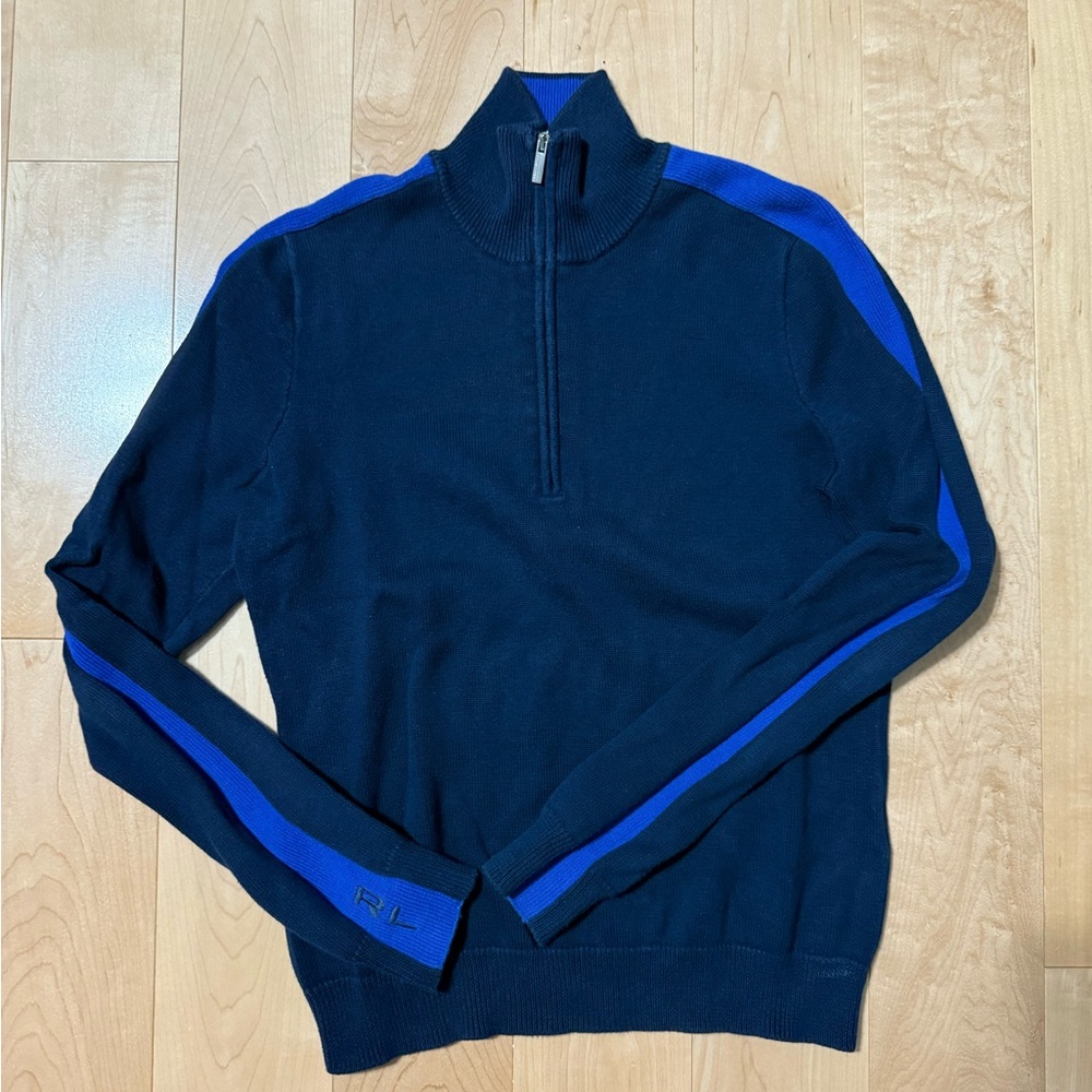 Ralph Lauren blue quarter zip sweater with light blue stripe on side.